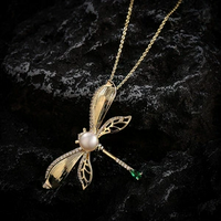 FRESHWATER PEARL NECKLACE AND BROOCH