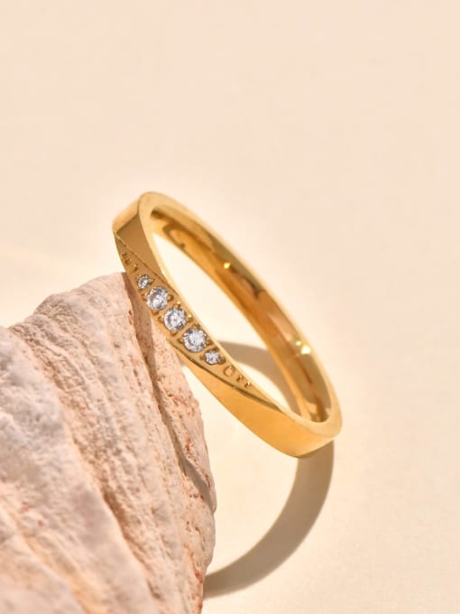 STAINLESS STEEL GOLDEN CUBIC ZIRCONIA RING